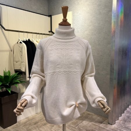 폴라 펀칭 패턴 배색 니트