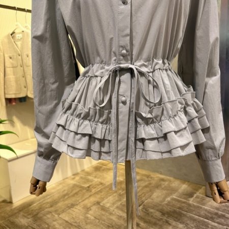 스트랩 프릴 이중단 블라우스