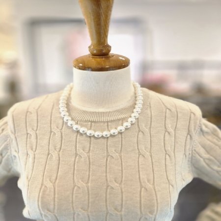 엘비꽈배기니트