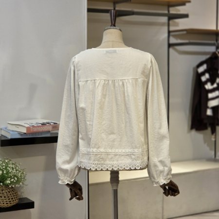 요크 셔링 레이드 밑단 블라우스