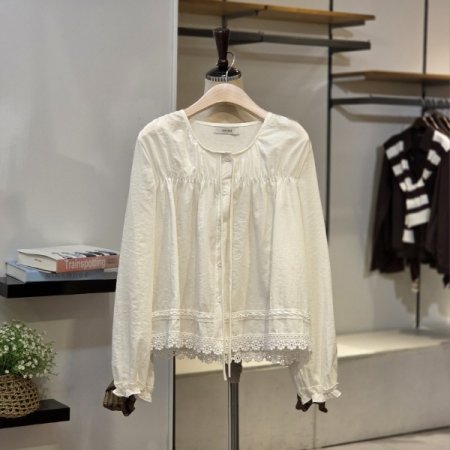 요크 셔링 레이드 밑단 블라우스