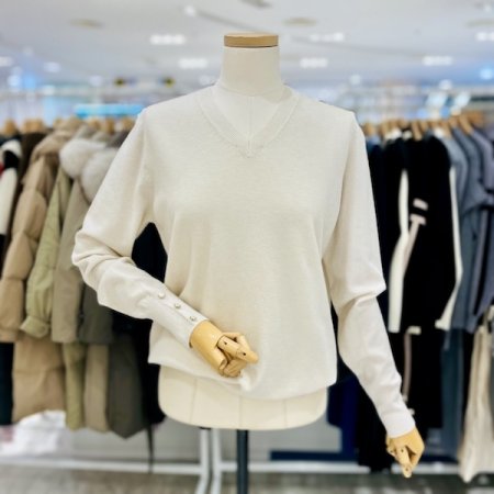 소매 금장 단추 니트