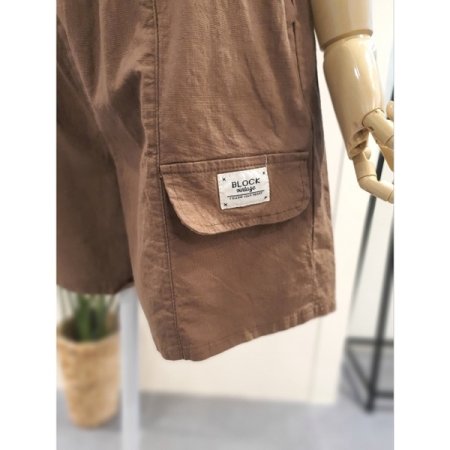 라벨 장식 4부 반바지 브라운