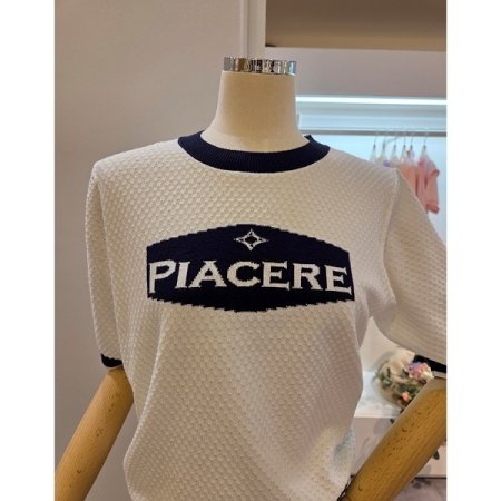 레터링 배색 라운드넥 니트