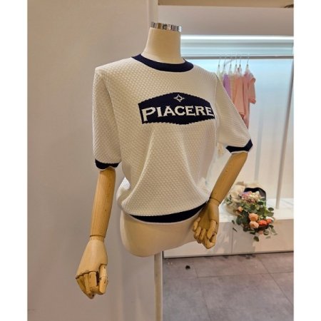 레터링 배색 라운드넥 니트