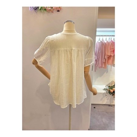 태슬 라운드 블라우스