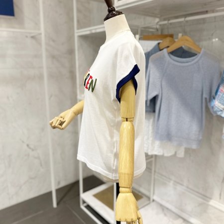 레터링 캡소매 니트