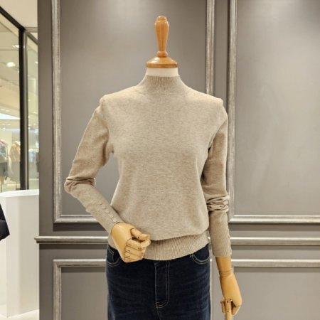 소매 단추장식 반폴라 니트