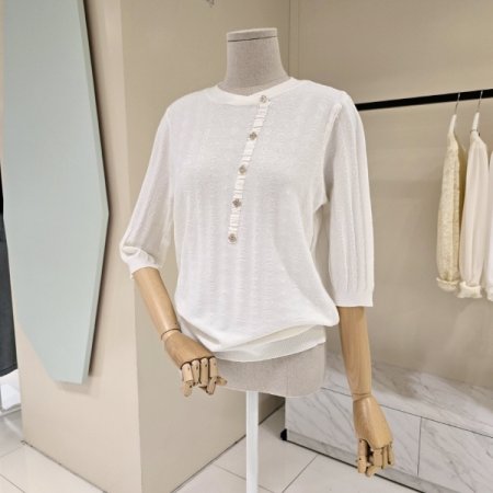 라운드 큐빅 단추 니트