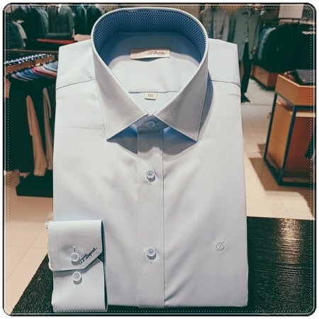 시그니처인 풀로고 자수를 수놓은 셔츠