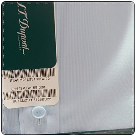 시그니처인 풀로고 자수를 수놓은 셔츠