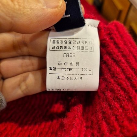 오버핏 꽈배기 터틀넥 니트