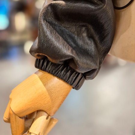 밑단 스트링 라운드 레더 점퍼